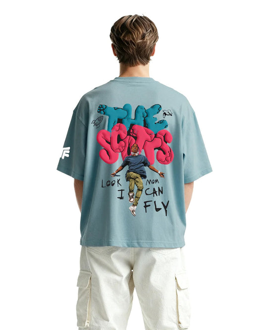 Clothav The Scotts Graphic Oversized T-Shirt for Men & Women | Blue Travis-Inspired Streetwear Back Print Tee