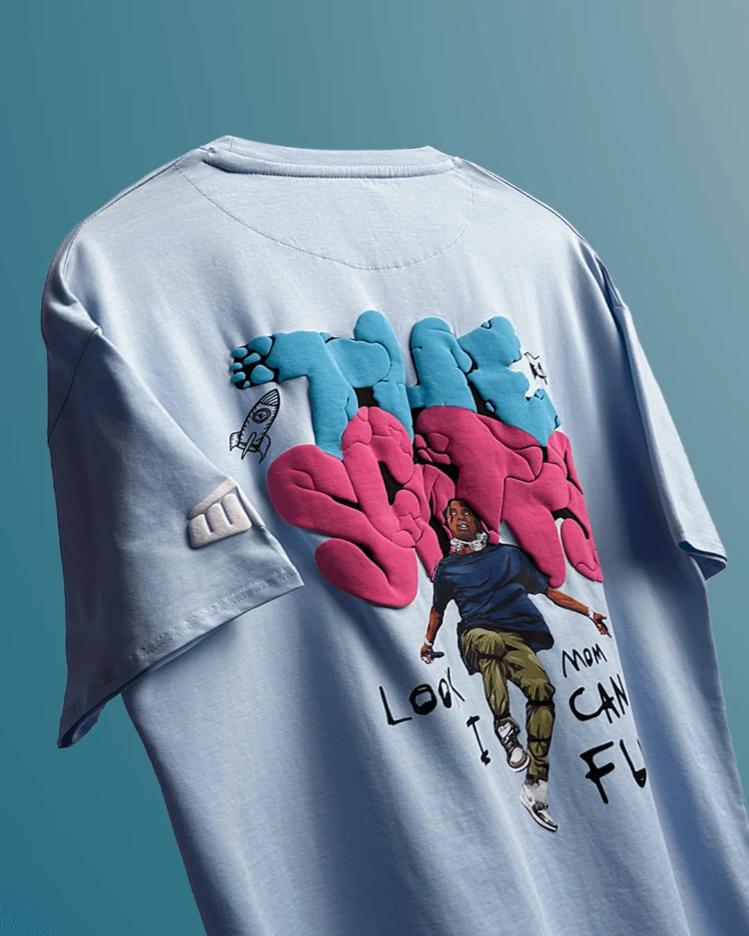 Clothav The Scotts Graphic Oversized T-Shirt for Men & Women | Blue Travis-Inspired Streetwear Back Print Tee